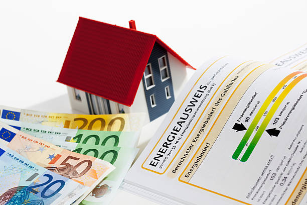 Model House With Energy Performance Certificate And Euro Notes Model house with energy performance certificate and bunch of euro notes energieausweis stock pictures, royalty-free photos & images