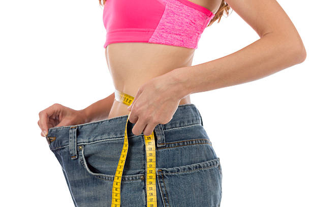 istock Waist line measuring with a tape 522075713