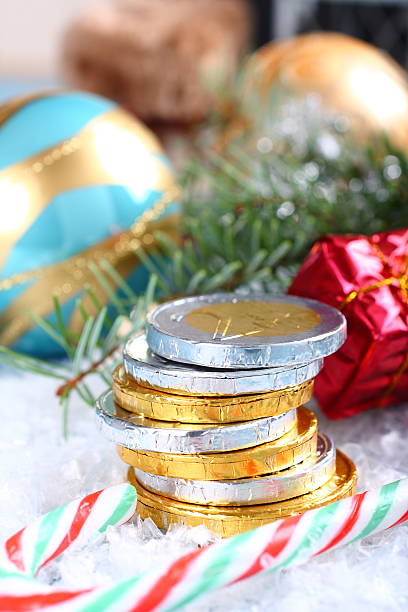 istock Christmas composition with stacked chocolate euro coins 522077463