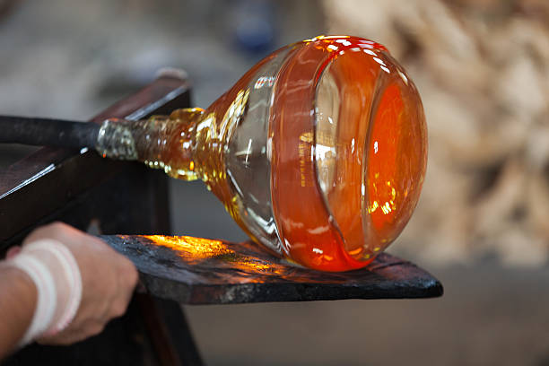 glass blower carefully making his product glass blower carefully making his product. Murano, Venice murano stock pictures, royalty-free photos & images
