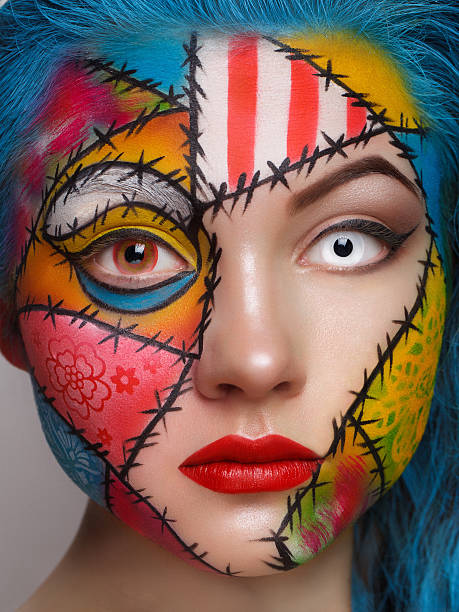 istock Close up color women face art 522078027
