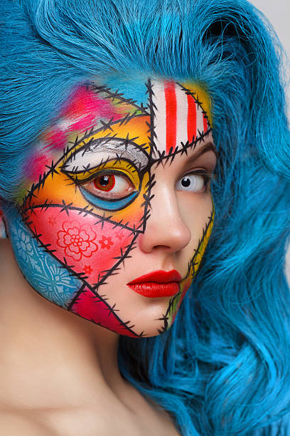 istock Young beautiful girl with a pattern on the face 522078093