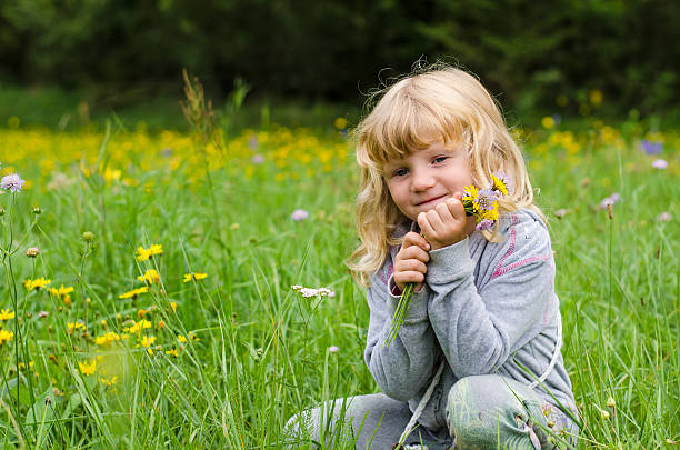 istock girl with flowers 522079181