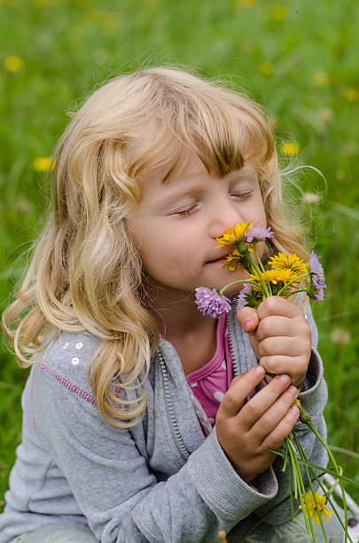 istock girl with flowers 522079447