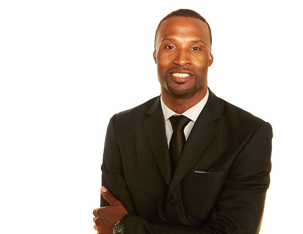 istock African American Businessman Smiling Over White Background 522094403