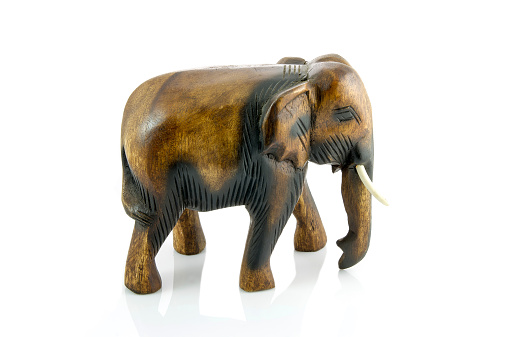 Papier mache elephant painted with one gesso layer.