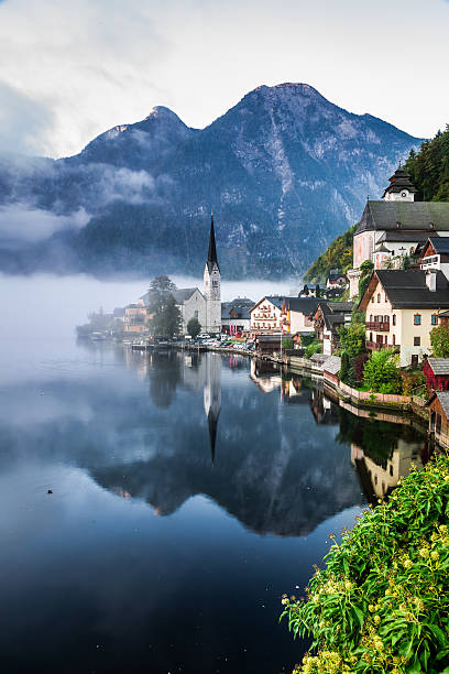 istock Sunrise in misty Hallstatt 522097819