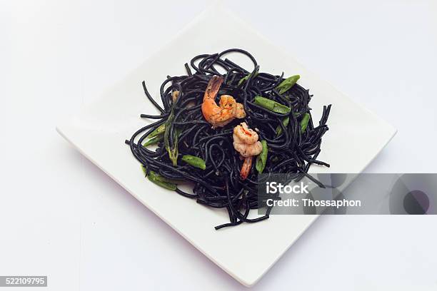 Black Tagliatelle With Shrumps Mussel And Squid Stock Photo - Download Image Now - Arugula, Basil, Black Peppercorn