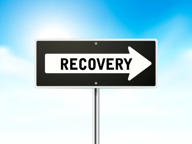 istock recovery on black road sign 522109863