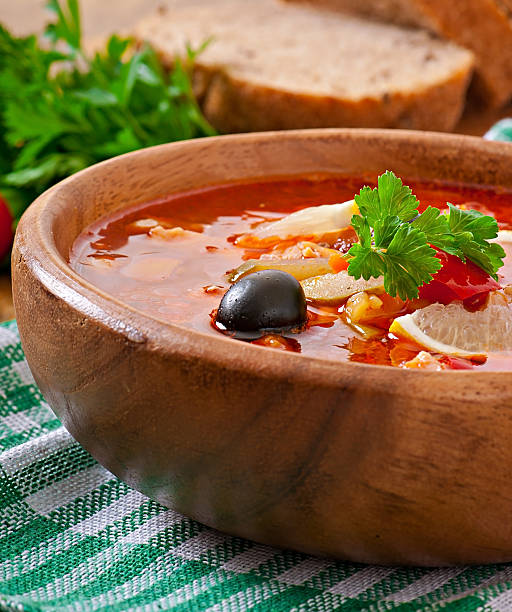 istock Soup solyanka Russian with meat, olives and gherkins 522112911