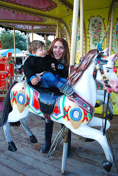 istock Family Fun in Amusement Park 522113433
