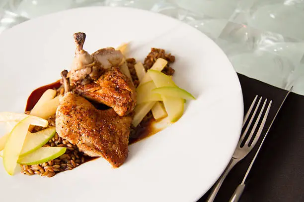 Roasted cornish game hen with toasted rye berries, compressed apple, caramelized salsify, and chartreuse jus