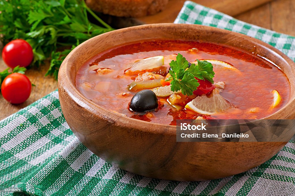 Soup solyanka Russian with meat, olives and gherkins Beef Stock Photo