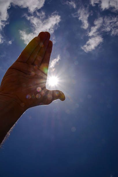 istock Hand over the Sky and Sun 522120296