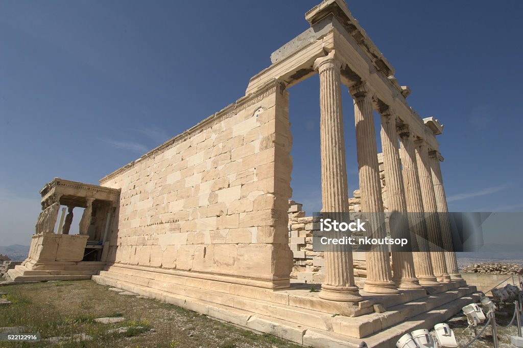 The Erechtheion An ancient Greek temple dedicated to Athena and Poseidon, in the Acropolis of Athens in Greece. Acropolis - Athens Stock Photo