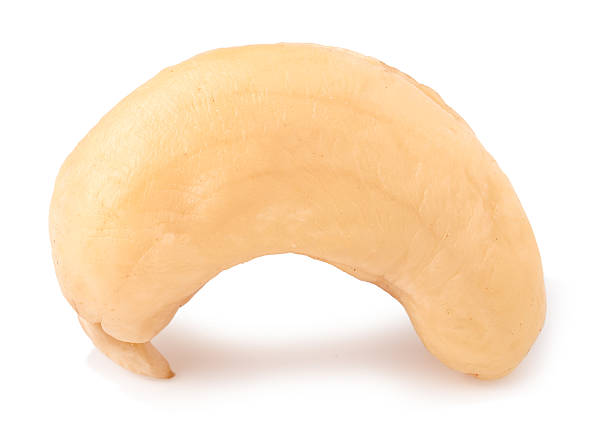 istock one cashew isolated on white background close-up macro 522126068