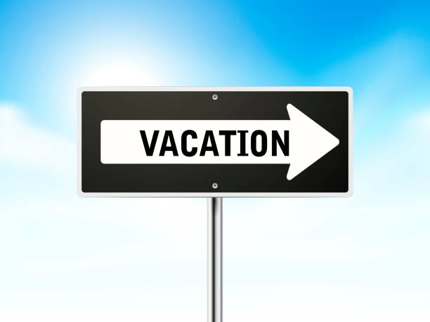 istock vacation on black road sign 522127803