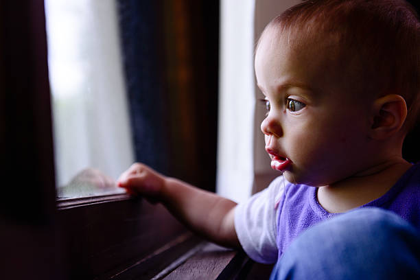 istock Baby Looking out the Window 522127953