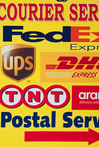 Kathmandu, Nepal - April 2, 2016: Board pointer to point courier worldwide in Kathmandu, Nepal. United Parcel Service (UPS), Federal Express (FedEx) and DHL Express are the main competitors in the global logistics market.