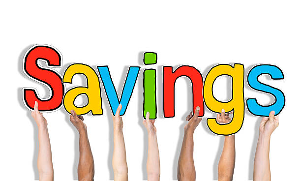 istock Multiethnic Group of Hands Holding Word Savings 522131325
