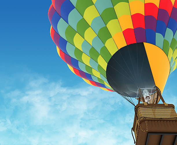 Beautiful Hot Air Balloon against a deep blue sky. Beautiful Hot Air Balloon against a deep blue sky hot air balloon stock pictures, royalty-free photos & images