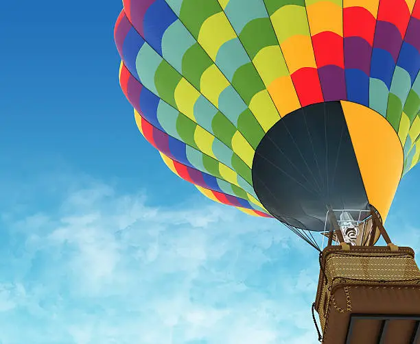 Photo of Beautiful Hot Air Balloon against a deep blue sky.