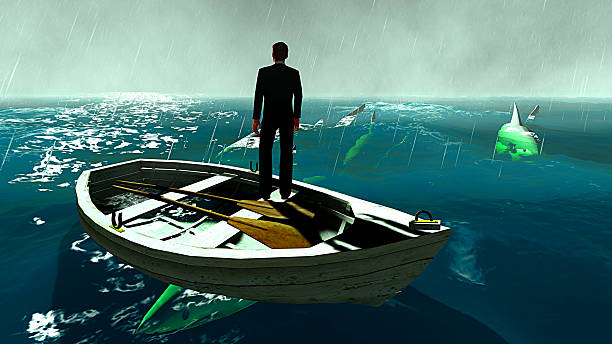 istock businessman surrounded by sharks 522134109
