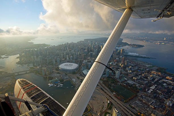 The City of Vancouver, Canada seen from a boat plane in the evening light.