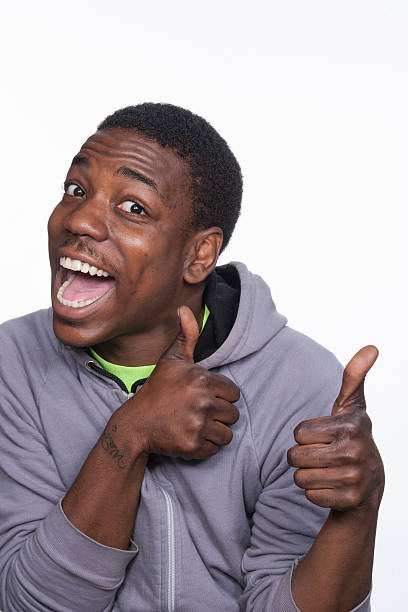 African american man with thumbs up