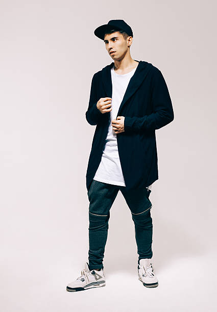 istock Cool fashion male model posing. Baseball cap. Studio. Indoor. 522139222