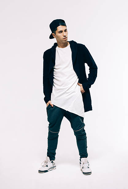 istock Cool fashion male model posing. Baseball cap. Studio. Indoor. 522139290
