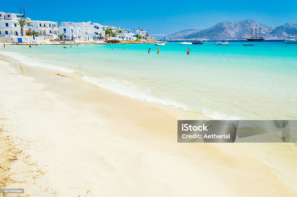 Beach at koufonisia harbor Beach paradise and turquoise waters at Koufonisia, Little Cyclades, off the coast of Naxos, Greece Aegean Sea Stock Photo