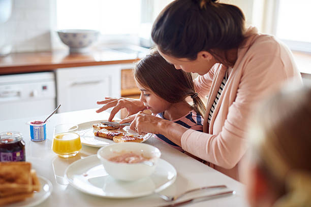 istock Let Mommy help you with that sweetheart 522141018