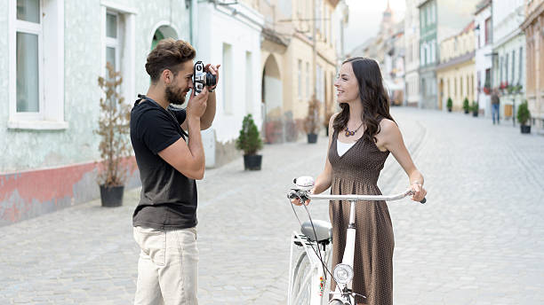 istock man focusing on woman's face 522144602