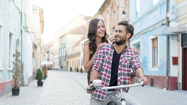 istock romantic looking and a bike 522144984