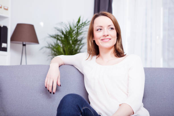 istock Happy smiling brownd haired young woman sitting on 522145746