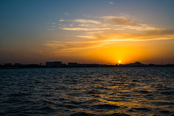 sunset from the Arabian gulf - Doha , Qatar