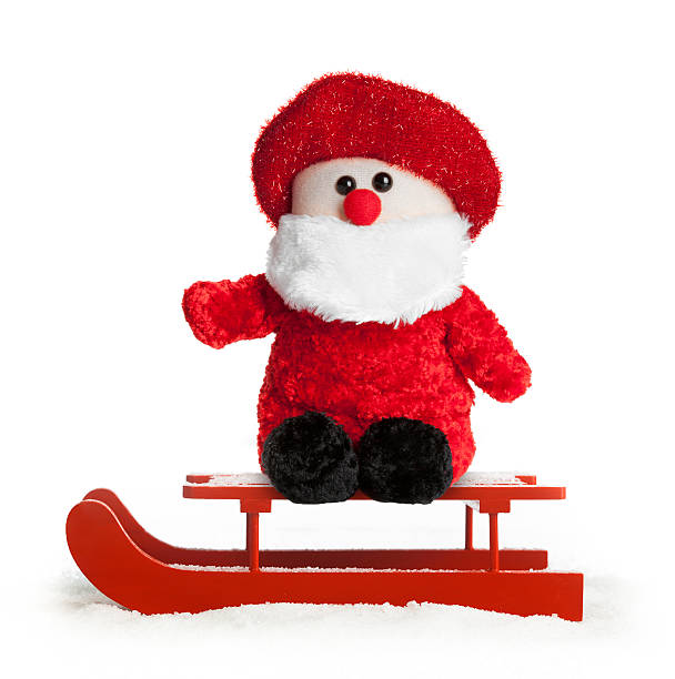 istock Wooden red sled with Santa Claus plush 522149311