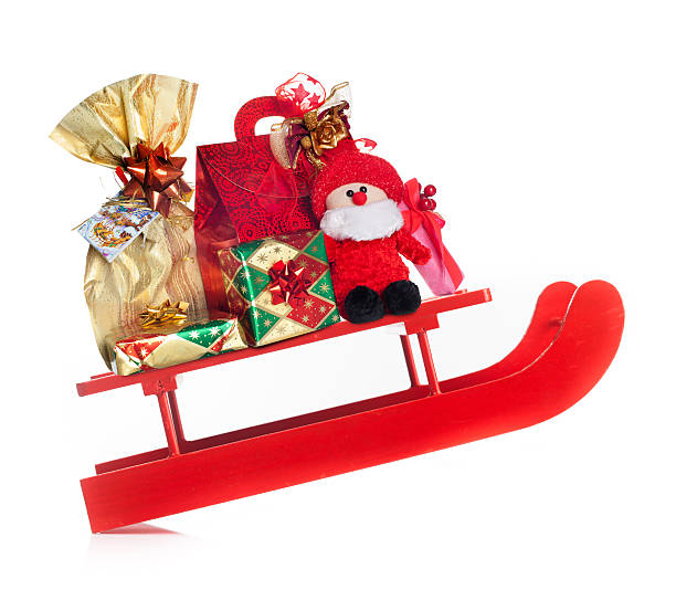 istock Sledding with Christmas gifts prancing 522150153