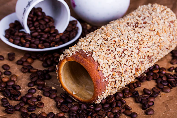 Hungarian a round loaf with peanuts Hungarian a round loaf with peanut and chocolate trdelník stock pictures, royalty-free photos & images
