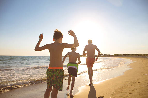istock Young family on the beach 522151394