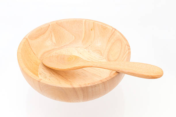 istock wooden bowl and spoon 522152029