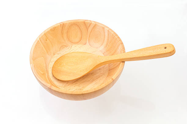 istock wooden bowl and spoon 522152039