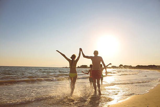 istock Young family on the beach 522152046