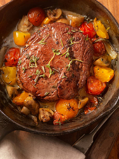 istock Prime Rib Steak with Tomatoes and Mushrooms 522152340