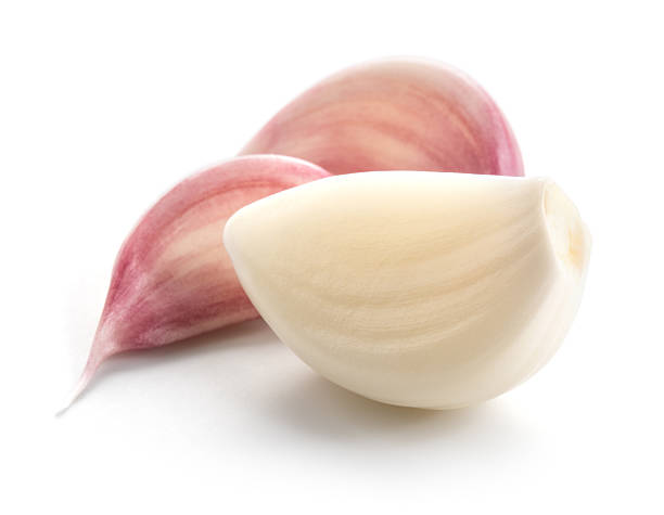 白い背景に分離されたニンニククローブ。 - garlic clove isolated white ストックフォトと画像