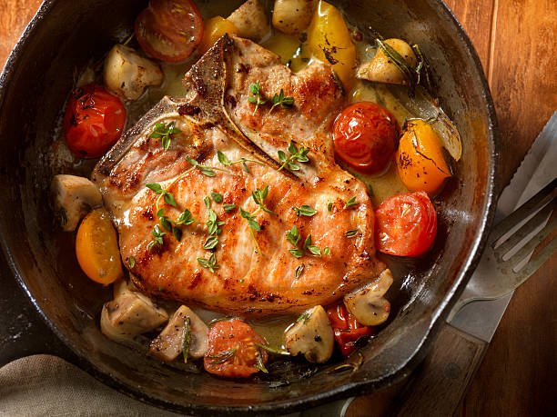 istock Pork Chops with Tomatoes and Mushrooms 522152770