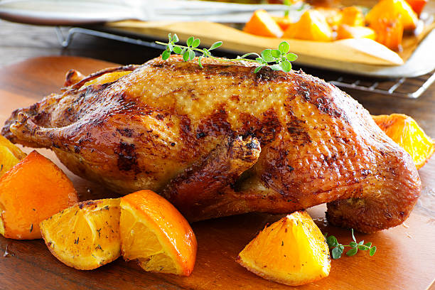 istock Roast duck with pumpkin and oranges. 522153243