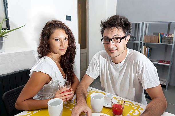 istock teenage couple has breakfast at home 522165997