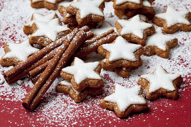 Cinnamon stars and spices sprinkled with powder sugar